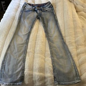 Stone washed rock revival boot cut jeans